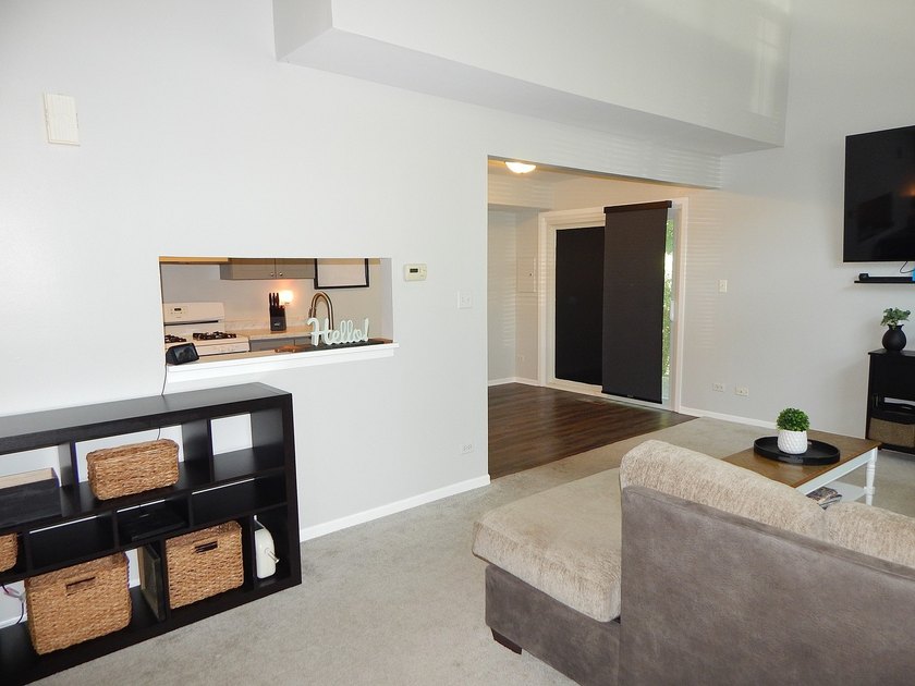 This immaculate end-unit townhome offers 2 bedrooms, 1 1/2 baths - photo 3
