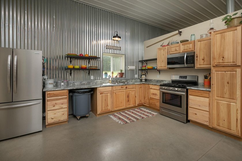 Nestled deep within 60 acres of pristine woodland just 15 - photo 20