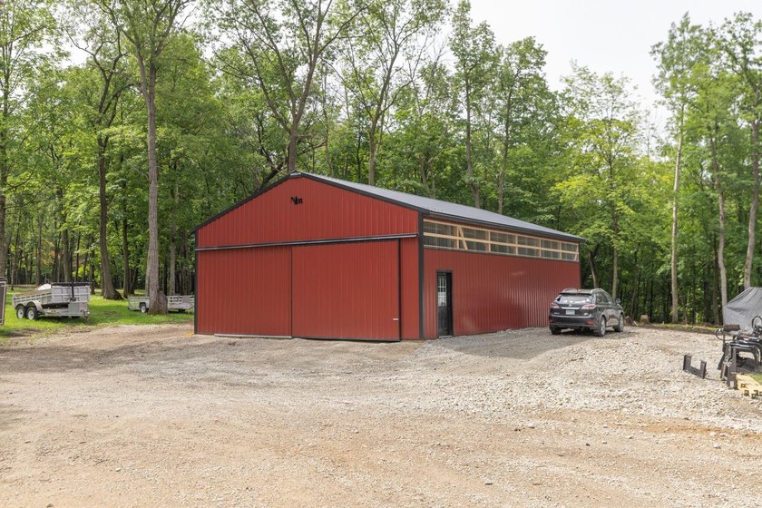 Nestled deep within 60 acres of pristine woodland just 15 - photo 34