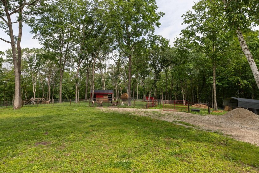 Nestled deep within 60 acres of pristine woodland just 15 - photo 39
