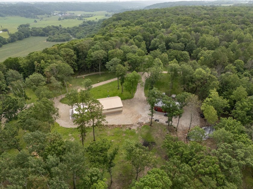 Nestled deep within 60 acres of pristine woodland just 15 - photo 42