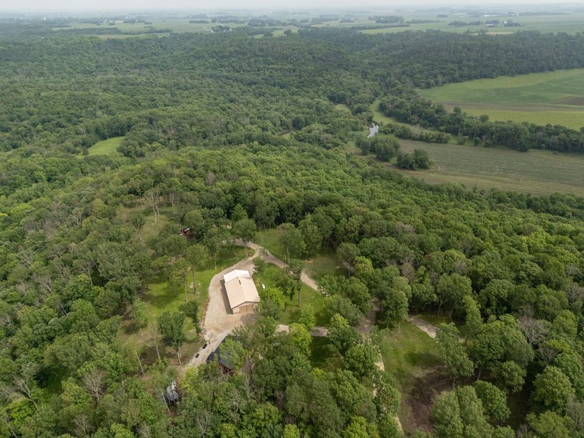 Nestled deep within 60 acres of pristine woodland just 15 - photo 44