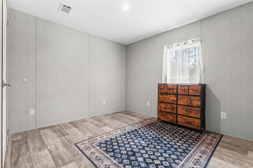 Looking for privacy, acreage, and room to roam? This like-new - photo 14