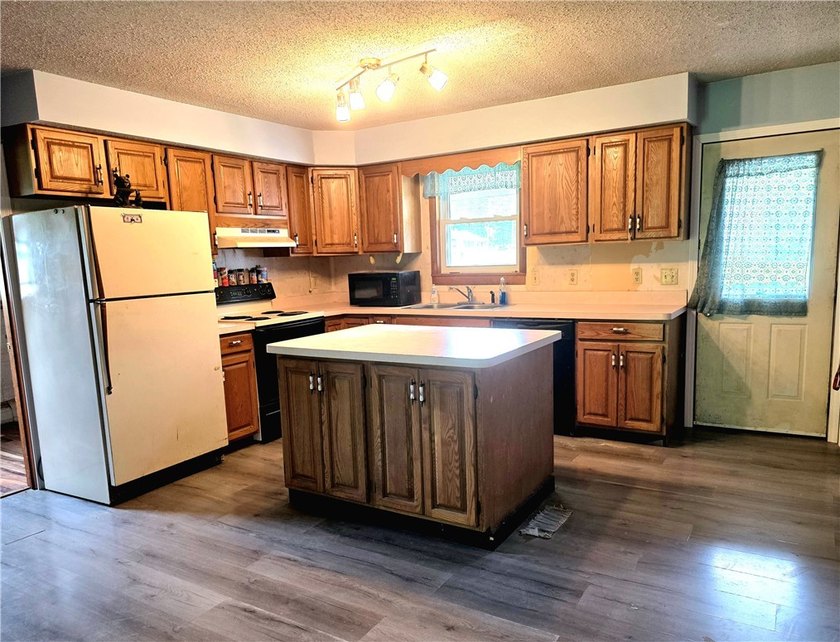Discover this well maintained two-story home featuring four - photo 3