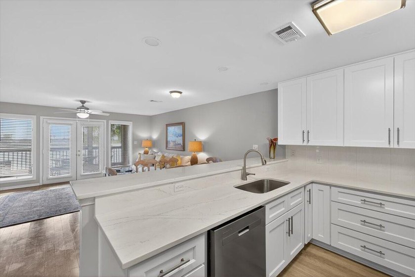 Nestled within Seascape Resort, this 3BR/3BA residence captures - photo 4