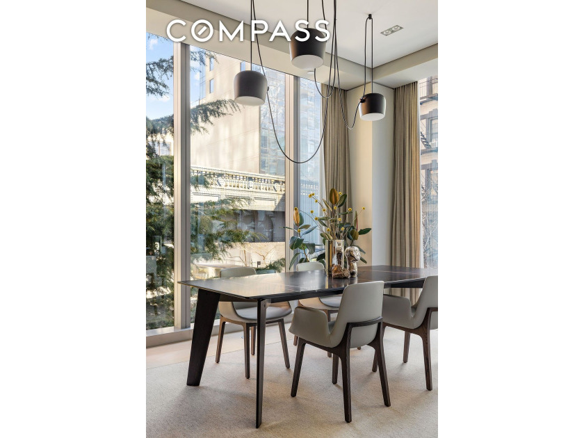 Floor to ceiling windows flood this home with exceptional - photo 3