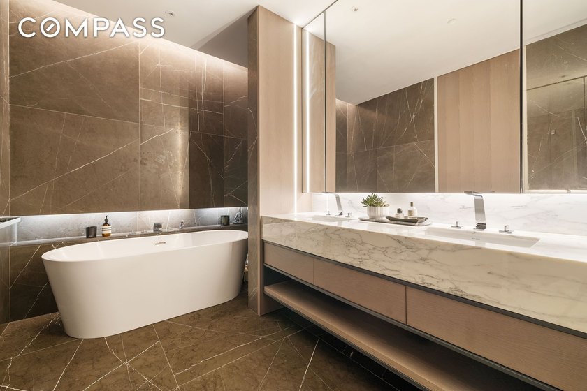 Floor to ceiling windows flood this home with exceptional - photo 8
