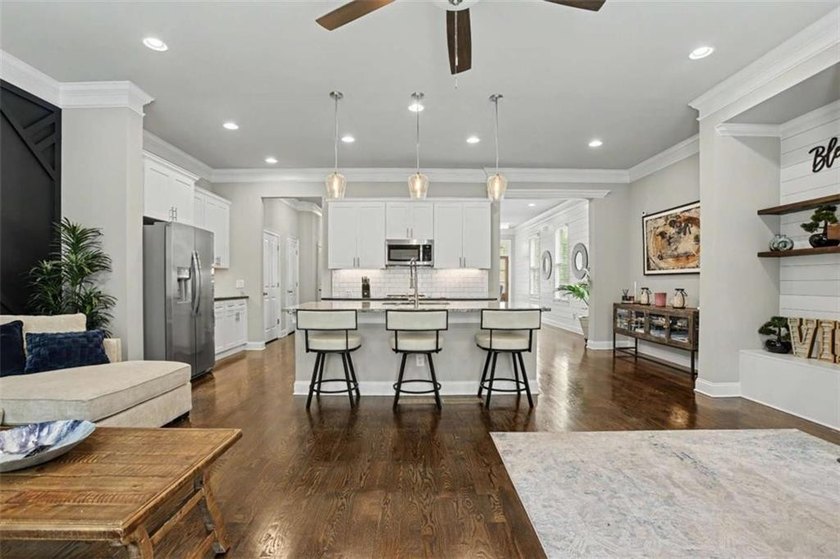 Experience elevated living in this exquisitely updated endunit - photo 6