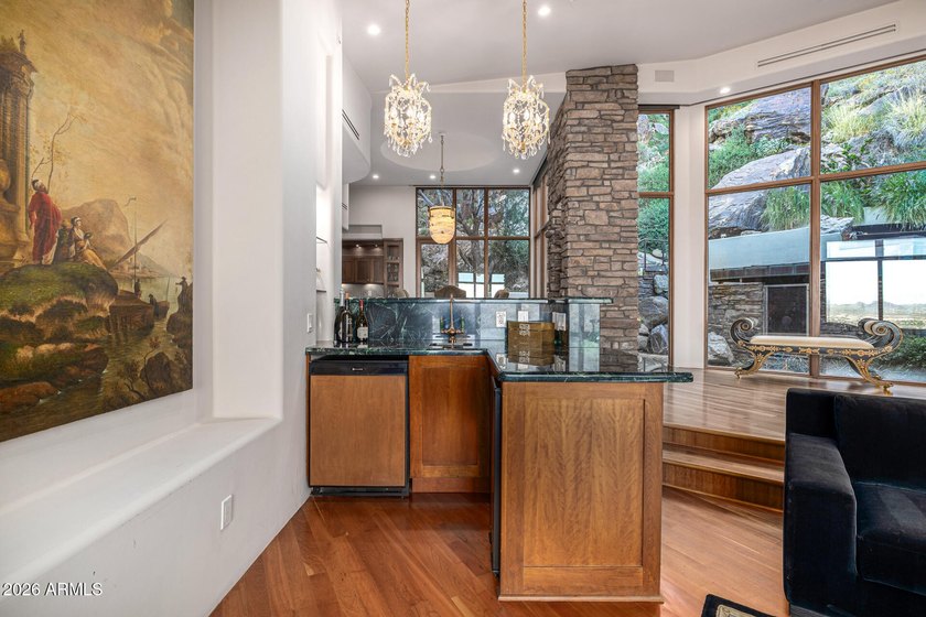 !!$500,000 below appraisal!! Perched atop Mummy Mountain in the - photo 17