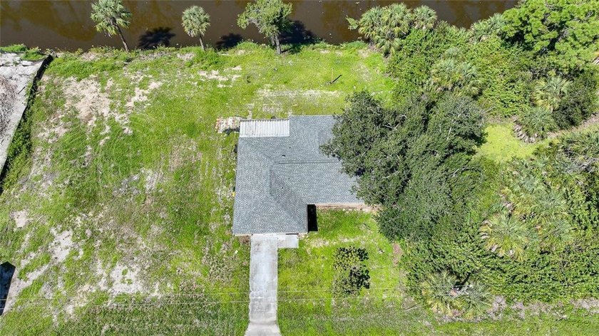 Rare double lot waterfront property offering approximately half - photo 2