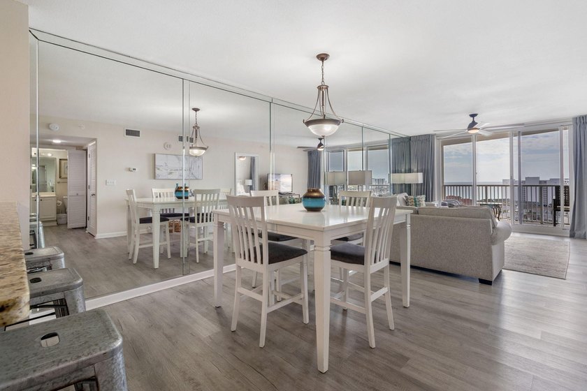 Ideally located at Pelican Beach Resort, this coastal condo - photo 2