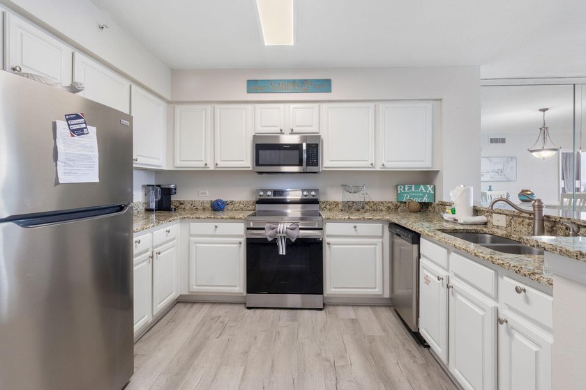Ideally located at Pelican Beach Resort, this coastal condo - photo 7