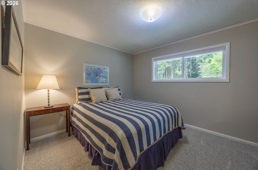 Enjoy this classic lakefront home with stunning views on the - photo 19