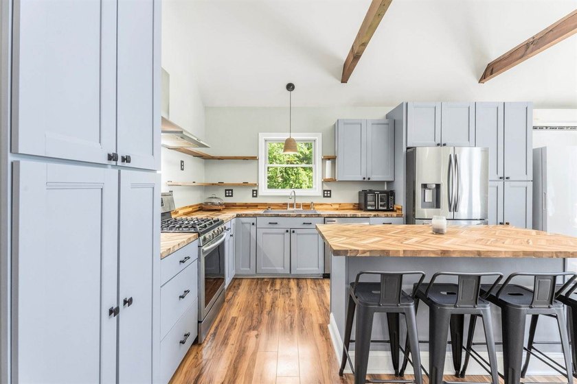 Nestled on 4 private acres just six minutes from downtown - photo 9