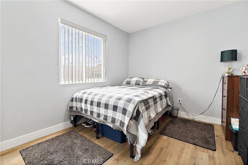 This well-maintained duplex offers two units under one roof - photo 24