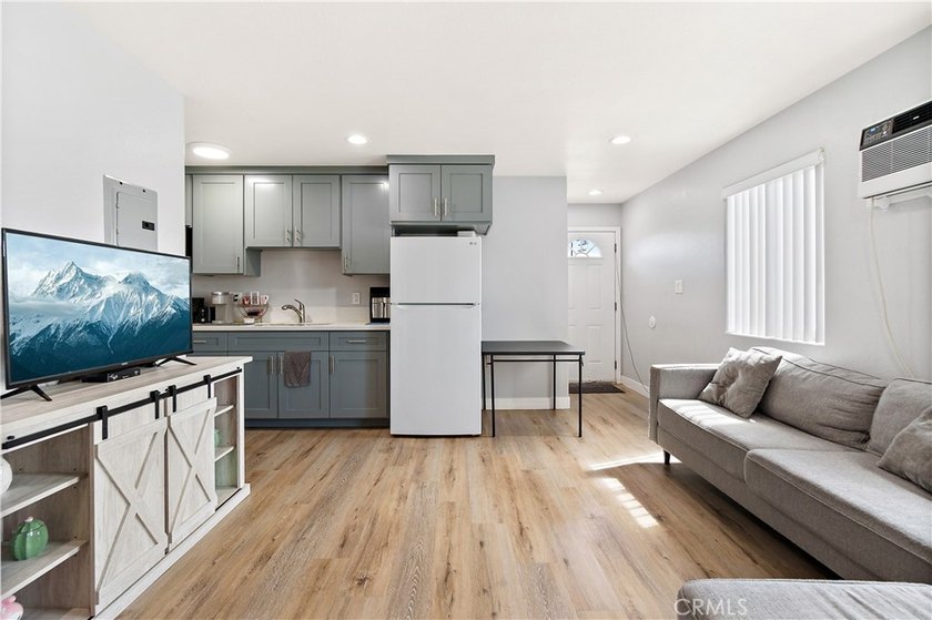 This well-maintained duplex offers two units under one roof - photo 26