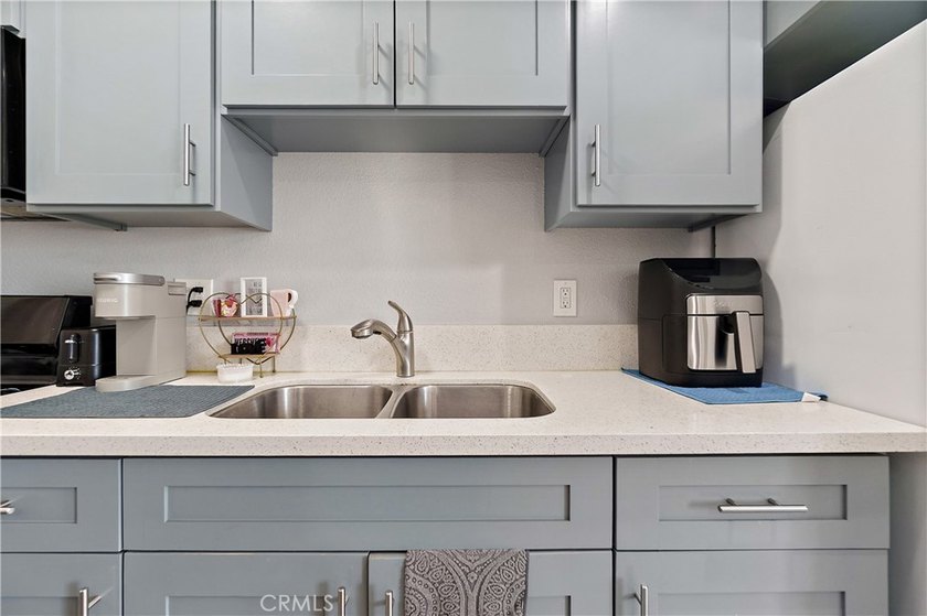 This well-maintained duplex offers two units under one roof - photo 27