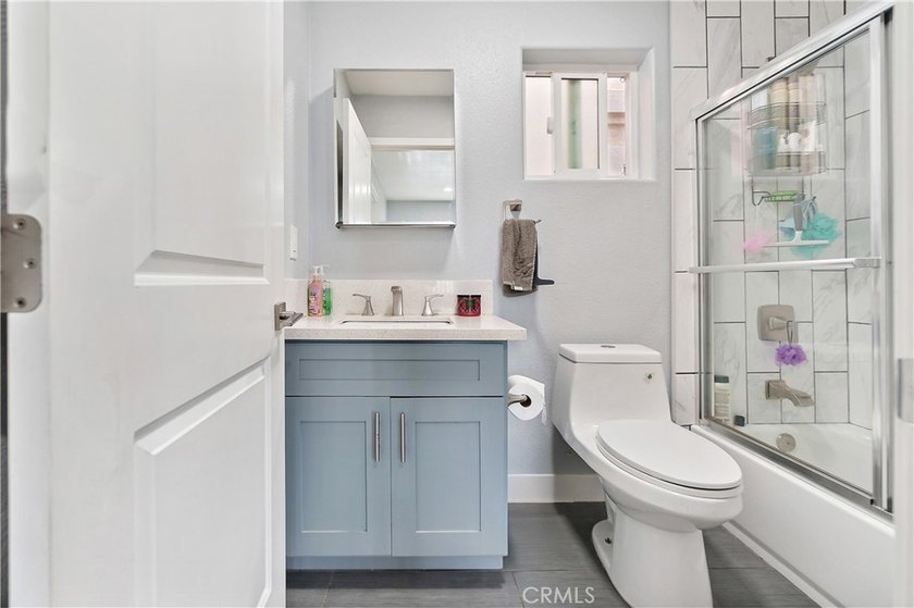 This well-maintained duplex offers two units under one roof - photo 36