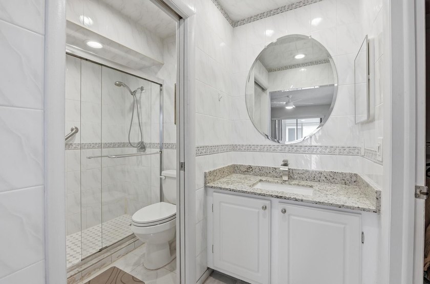 Step into this deluxe, completely renovated model featuring an - photo 12