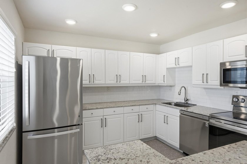 Step into this deluxe, completely renovated model featuring an - photo 18