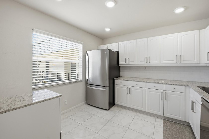 Step into this deluxe, completely renovated model featuring an - photo 19