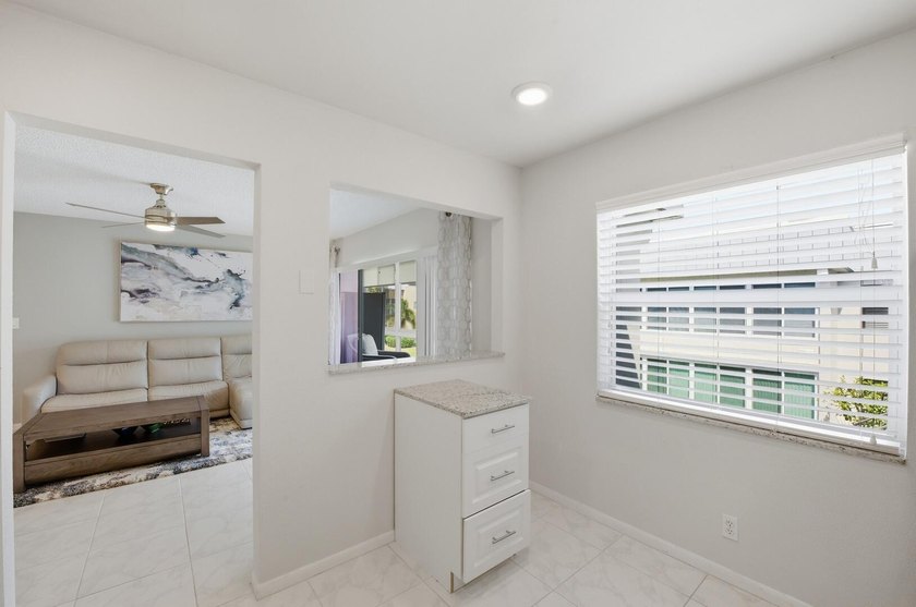 Step into this deluxe, completely renovated model featuring an - photo 22