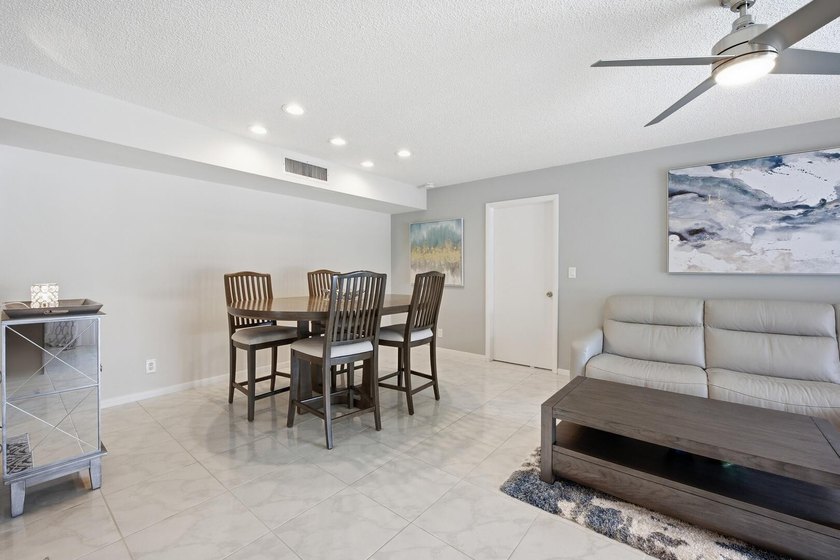 Step into this deluxe, completely renovated model featuring an - photo 25