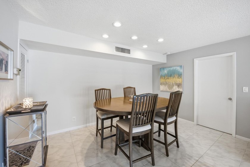 Step into this deluxe, completely renovated model featuring an - photo 26