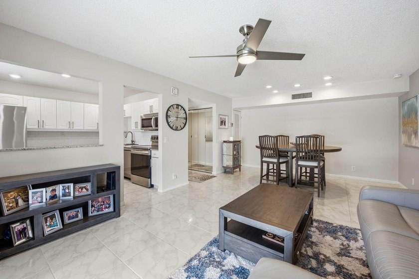 Step into this deluxe, completely renovated model featuring an - photo 33