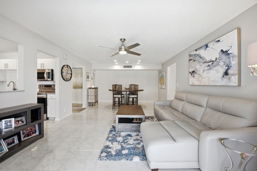 Step into this deluxe, completely renovated model featuring an - photo 34