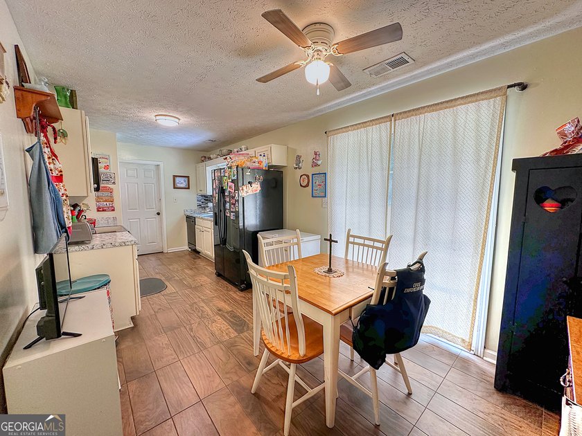 Welcome home to this charming 3-bedroom, 2-bath ranch nestled in - photo 8