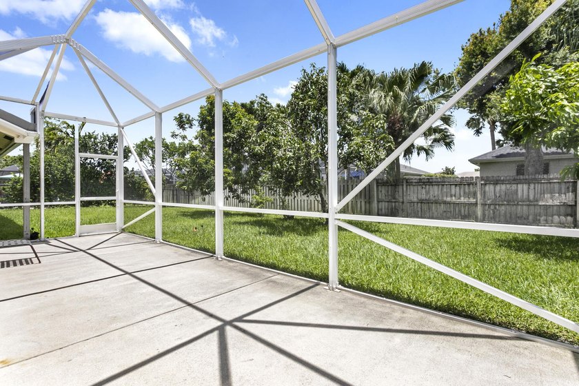 Nestled on a quiet street, this spacious CBS home is designed - photo 17
