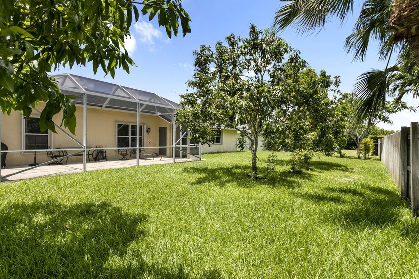 Nestled on a quiet street, this spacious CBS home is designed - photo 19