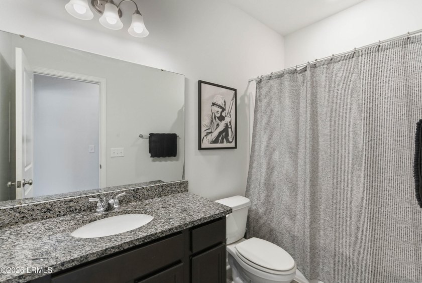 Set in Shell Point Farm, this one-story home offers the kind of - photo 9