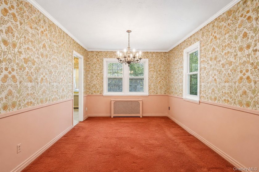 Welcome to this charming semi-detached brick home in the heart - photo 5
