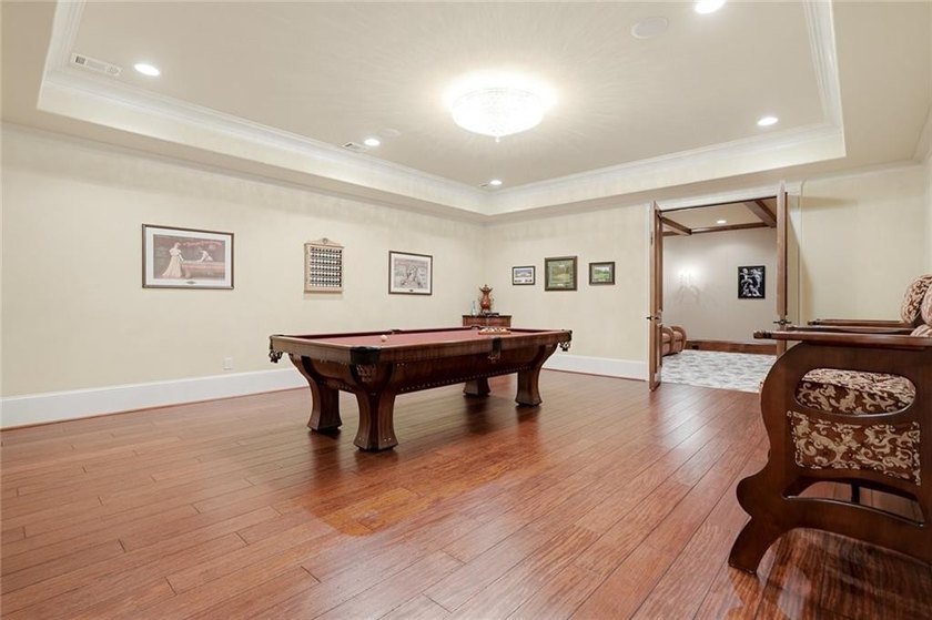 Perfectly positioned within the prestigious gated golf community - photo 37
