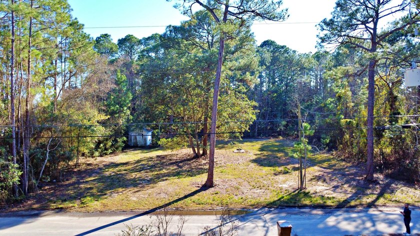 Cleared and build-ready vacant lot totaling approximately 0.4 - photo 3