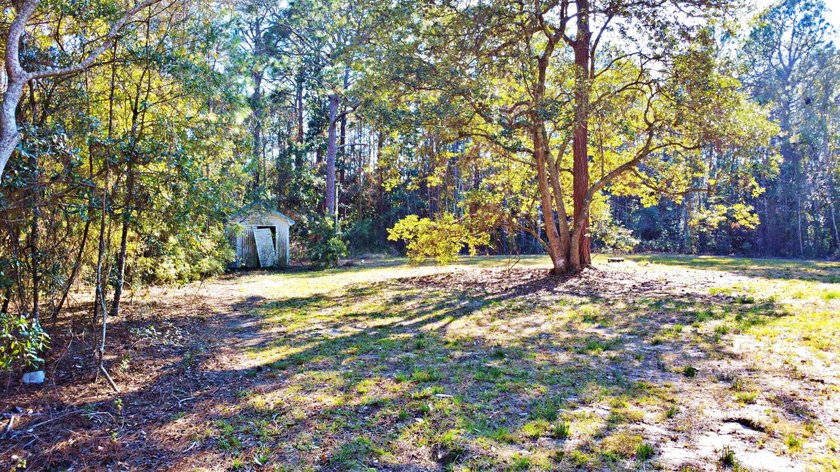 Cleared and build-ready vacant lot totaling approximately 0.4 - photo 4