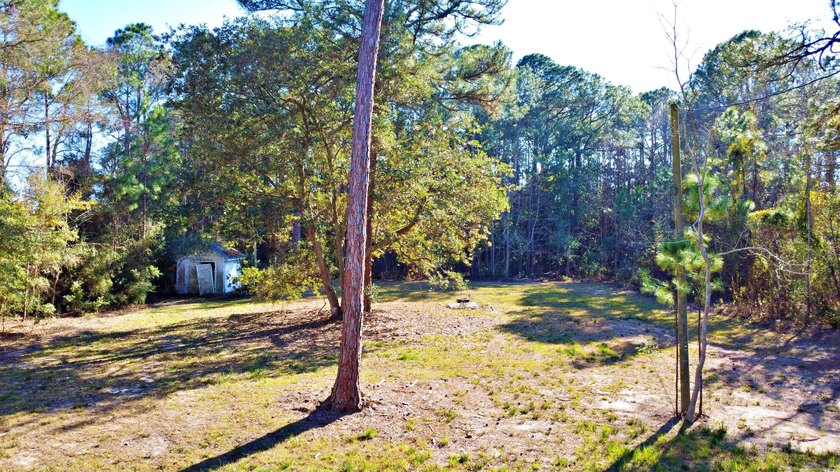 Cleared and build-ready vacant lot totaling approximately 0.4 - photo 5