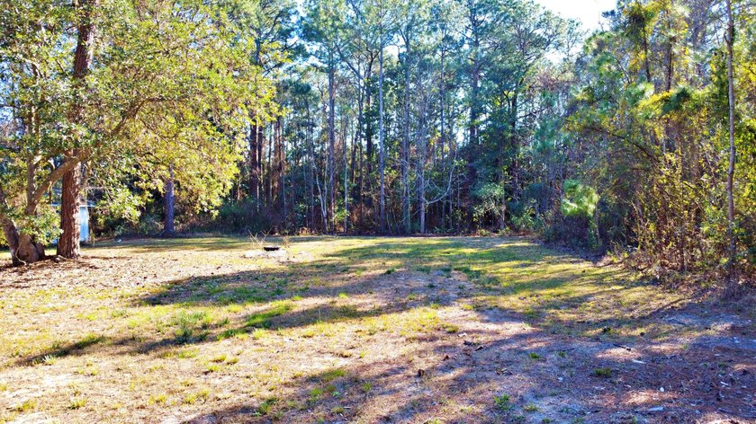 Cleared and build-ready vacant lot totaling approximately 0.4 - photo 7