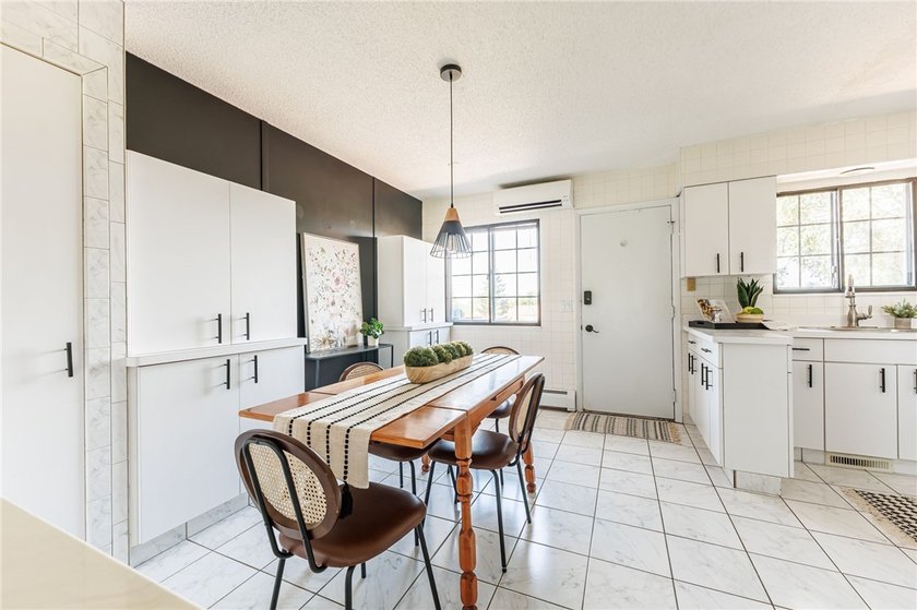 Move-in ready, low-maintenance living awaits! Welcome to 8 - photo 7