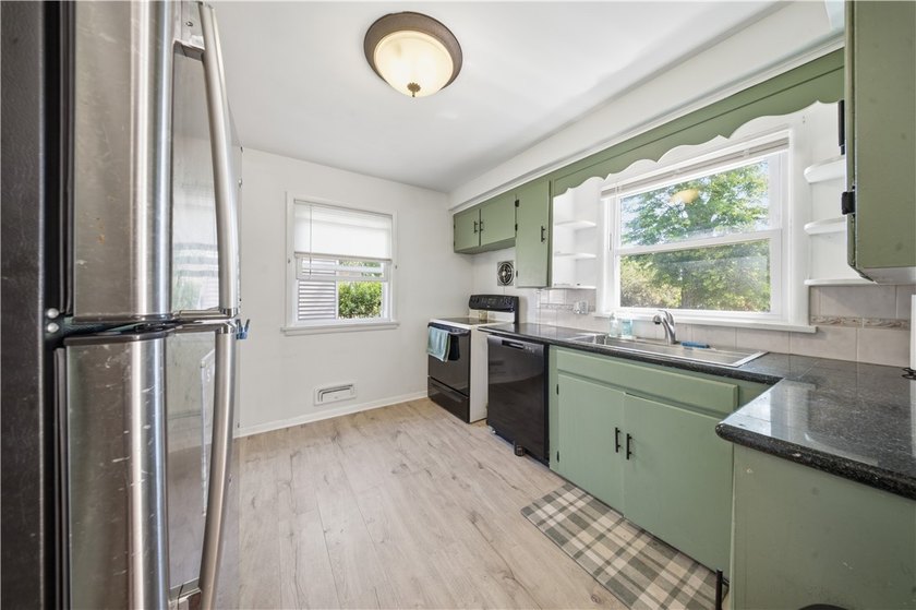 Welcome to 167 Ridgemont Drive! Nestled in a quiet - photo 9