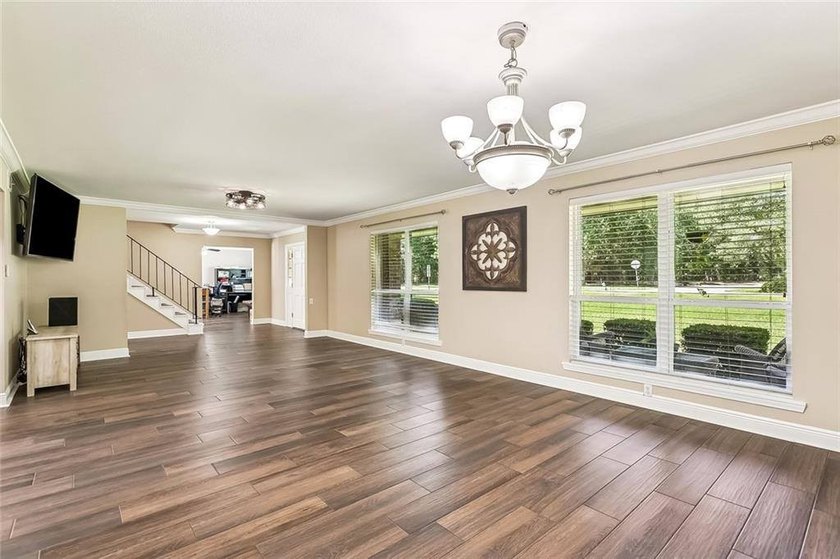 Walk up to a beautiful, traditional style home with front porch - photo 5