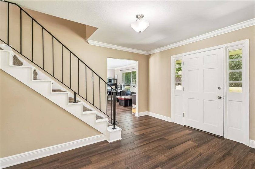 Walk up to a beautiful, traditional style home with front porch - photo 6