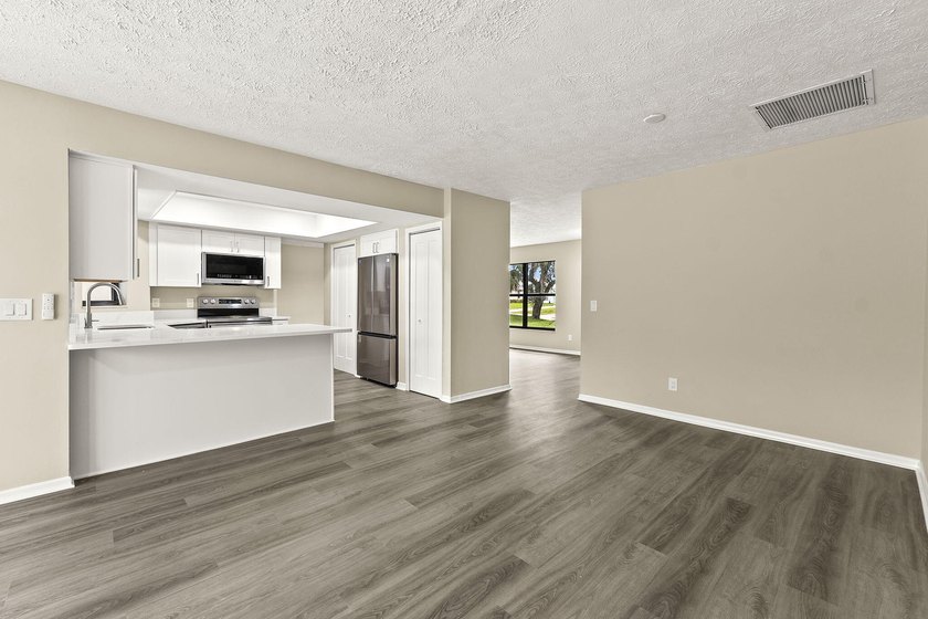 This beautifully remodeled pool home on an over sized lot is - photo 13