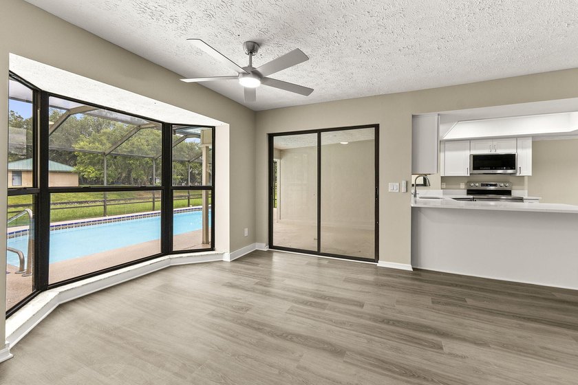 This beautifully remodeled pool home on an over sized lot is - photo 14