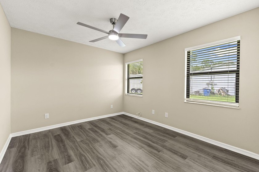 This beautifully remodeled pool home on an over sized lot is - photo 21