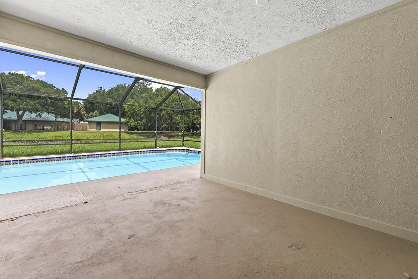 This beautifully remodeled pool home on an over sized lot is - photo 24