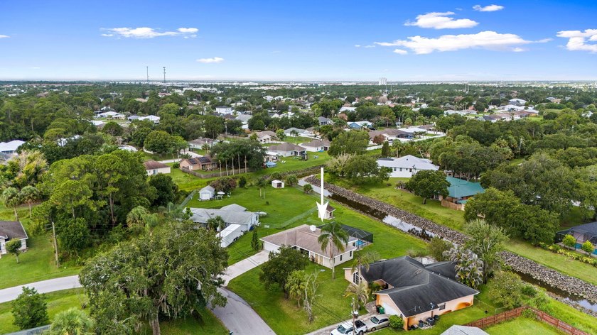 This beautifully remodeled pool home on an over sized lot is - photo 33