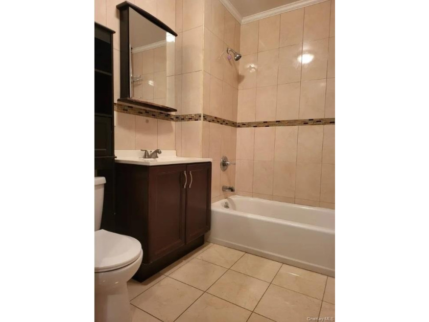 Welcome to 27 Cox Place , a well-maintained, attached brick - photo 6